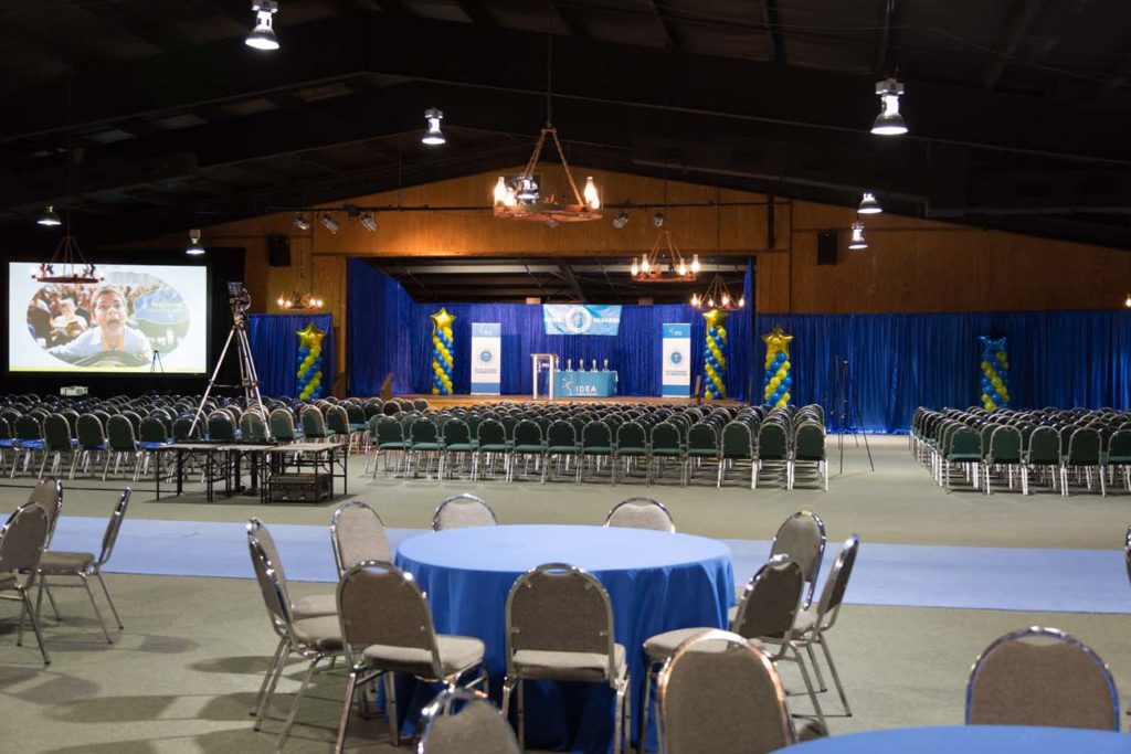fully decorated room with tables and chair setup