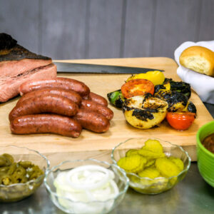 fully cooked bbq dinner brisket sausage beans pickles onions