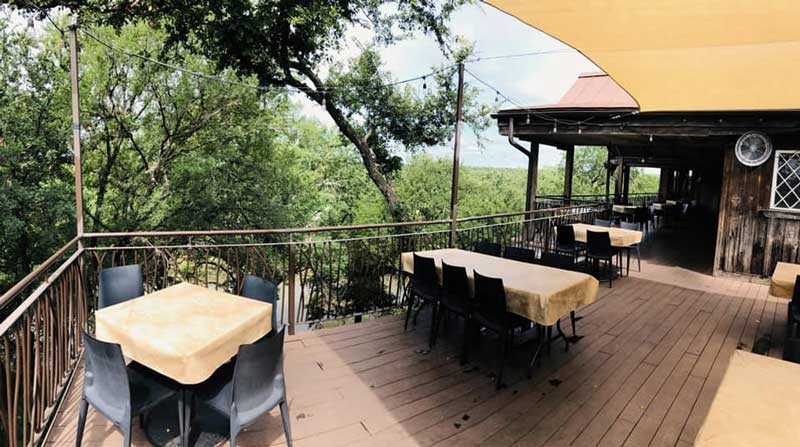 Hill Country dining on a patio at Gruene River Cafe
